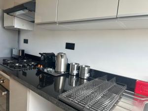 Appartement 1BR Prestige & Confort à Hay Riad