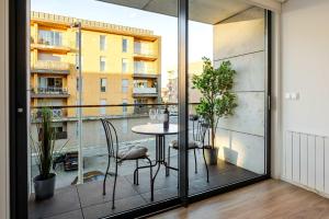 Spacious Light-Filled Flat with Garage by HostWise