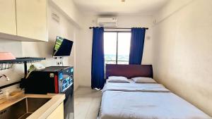 Apartement Skyhouse Bsd TL26K By LiviRooms Tangerang
