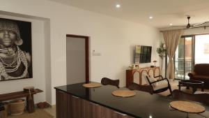 two bedroom Shanzu with rooftop poolminutes walk to beach