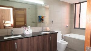 two bedroom Shanzu with rooftop poolminutes walk to beach