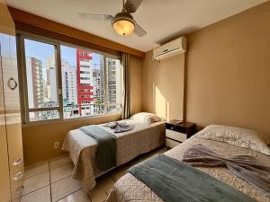 2 Dorm - Frente ao Shopping - Av Brasil