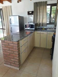 Casa con vista a las Sierras y pileta privada