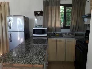 Casa con vista a las Sierras y pileta privada