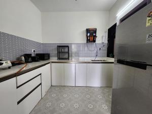 Candolim 2BHK Family Apartment with Mangrove View & Pool - Near Beach