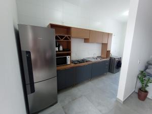 Apto completo e confortável em Barra Velha - Itajuba - 400m da praia