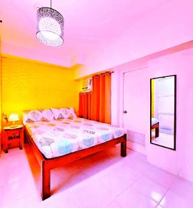 Tagaytay Hideaway 1-Bedroom Sleeps 4 in CITYLAND Prime Condo with Living room, Kitchen, Balcony, free Swimming Pool, 1 Parking, Wi-Fi, Netflix, Perfect View-Deck on 24F Rooftop