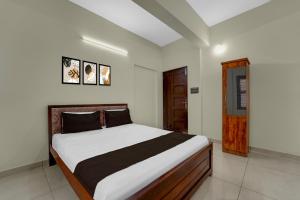 Hotel O Engineering College Sreekaryam Formerly B S Plaza