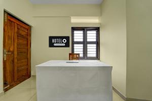 Super Hotel O Engineering College Sreekaryam Formerly B S Plaza