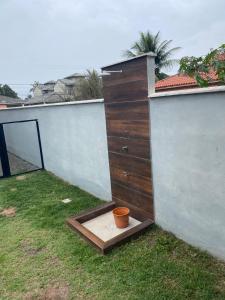 Suíte privativa aconchego a alguns passos da praia