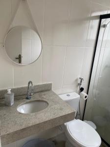 Suíte privativa aconchego a alguns passos da praia