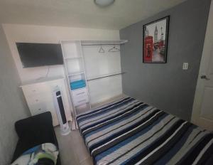 Aguilas Rooms 1 cama baño compartido