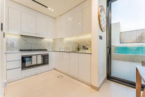 High-Floor 2BR with Private Pool Overlooking the Community, Steps from Park and Circle Mall, Binghatti Azure, JVC by Deluxe Holiday Homes