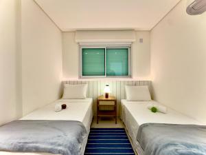 Apartamento Frente Mar com Vista Mar incrível 3 Quartos Ar-condicionado Cozinha Completa e Churrasqueira privativa em Condomínio Home Club com Piscina com Borda Infinita, Jacuzzi Academia, Brinquedoteca quadra de Beach Tenis e 2 Vagas de garagem