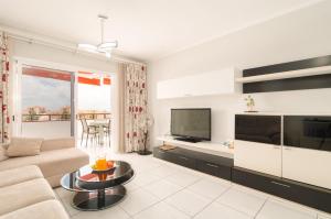 Spacious 2 bdr apartment heated pool, garage