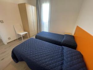 Sunny family apartment steps from the beach