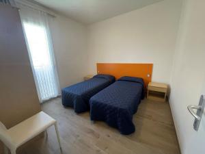 Sunny family apartment steps from the beach