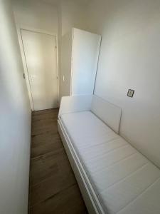 Sunny family apartment steps from the beach