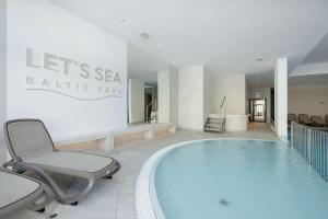 LETS SEA 55 Apartment with Sea View, Sauna & Pool and Parking by Noclegi Renters