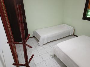 Dois quartos a cinco minutos a pé da praia do Forte