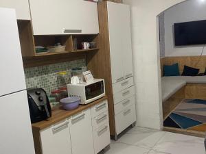 Casa nas Palmeiras rua da Lagoa composta por 2 quartos sala cozinha banheiro e uma varanda grande com uma churrasqueira MOBILIADA SUPER ACONCHEGANTE AMBIENTE FAMILIAR