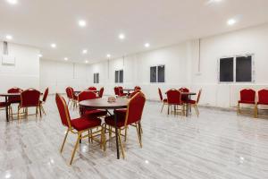 Capital O Che Sigma Hotel