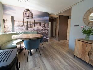 Holiday home in Petten with swimming pool