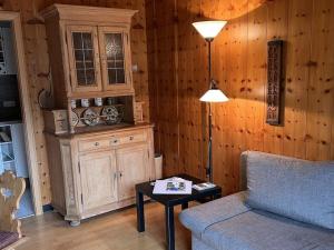 Pine-paneled room by the lake