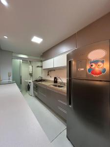 Apto novo, 2 quartos, quadra praia em Santos.