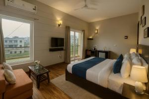 Pearl Grand Boutique Cottage In Omaxe Anandam Vrindavan -# Premium AC Rooms With Balcony # Big Parking # Lift # Garden # Peaceful Area # Near Prem Mandir # Property Of The Year # Most Awarded