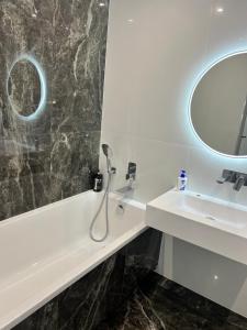 Сучасні апартаменти в новому ЖК Great House,район автовокзалу,центр,поруч обласна лікарня,парковка,автономне опалення,два окремі місця