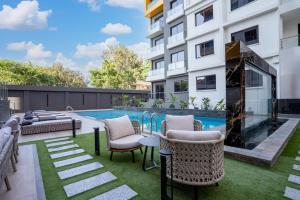 modern executive three bedroom apartment which features a swimming pool, state of the art fully equipped gym andmodern unmatched luxurious facilities which offfers luxury lifestyle