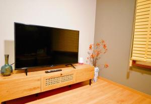 Spacious 40 Square Meter Suite with Separate Living Room and Bedroom Japanese Modern Style JR and Osaka Metro Access Near Kyocera Dome USJ