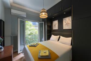 Charming Acropolis Flat with stunning shared Roof Terrace