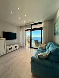 SUNSET WAVES vistas al mar