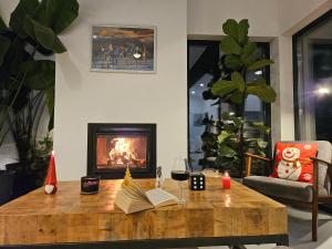 Black Walnut House with indoor outdoor fireplace