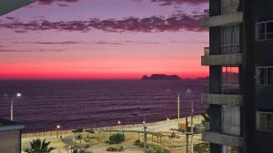 Ocean Sunset vista al mar, piscina y balcón