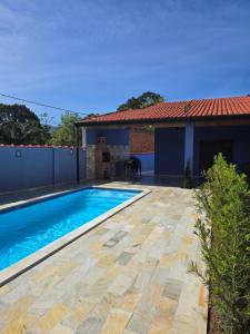 Beach house com picina e wi-fi