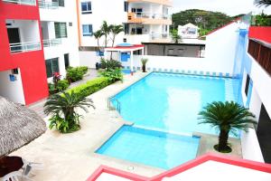 Relax en Tonsupa Moderno Depar con Aire C y a pasos del mar 3 piscinas 2hidro