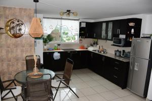 Relax en Tonsupa Moderno Depar con Aire C y a pasos del mar 3 piscinas 2hidro