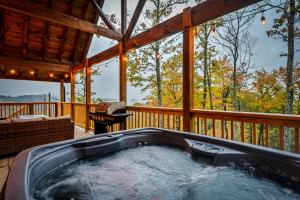 Cozy Mountaintop Cabin with Firepit, HotTub & Views!