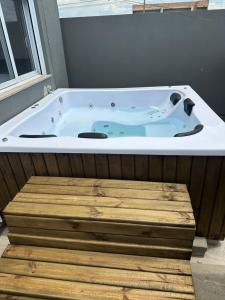 Casa com 3 dormitórios com jacuzzi para relaxar com a família!