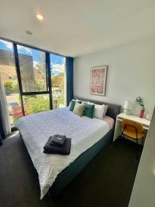 2BR-1BR-1Car- CBD Pool Central