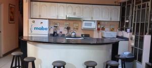 Encanto azul Jardín, Parrilla y juegos