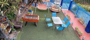 Encanto azul Jardín, Parrilla y juegos