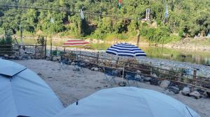 Tribe Riverbank Campsite