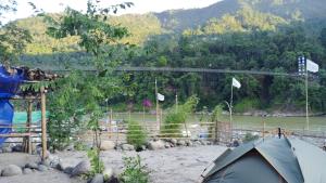 Tribe Riverbank Campsite