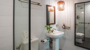 MiraNamin Nest CALACHUCHI - Cozy Room in Historic Home - Indoor Plunge Pool, Petite Desk, Garden View with Balcony, Self-Service Breakfast, Guest Kitchen, Rooftop, Pet-Friendly