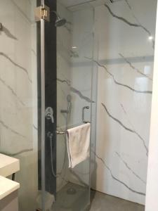 Urban Stay Grand Anukampa with Gym and Pool