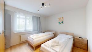 Großzügige 3 Schlafzimmer Wohnungen in Davos Bergblick zentral